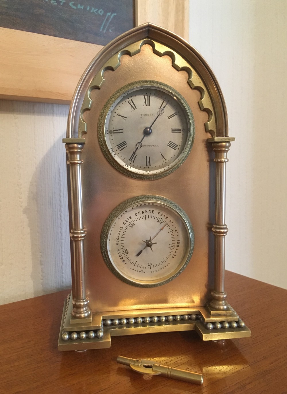 brass and copper cased gothic mantel clock