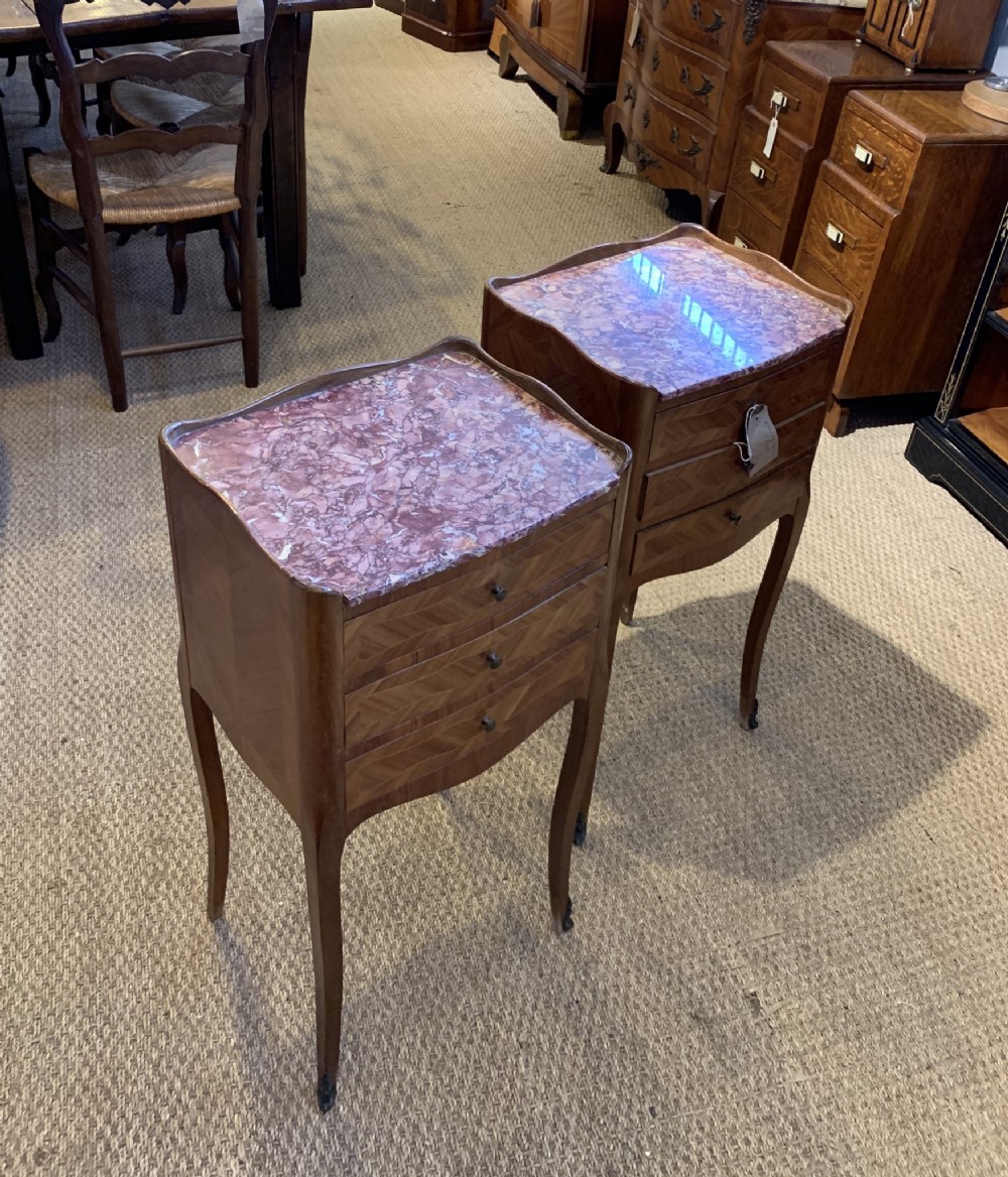 pair of bedside cabinets