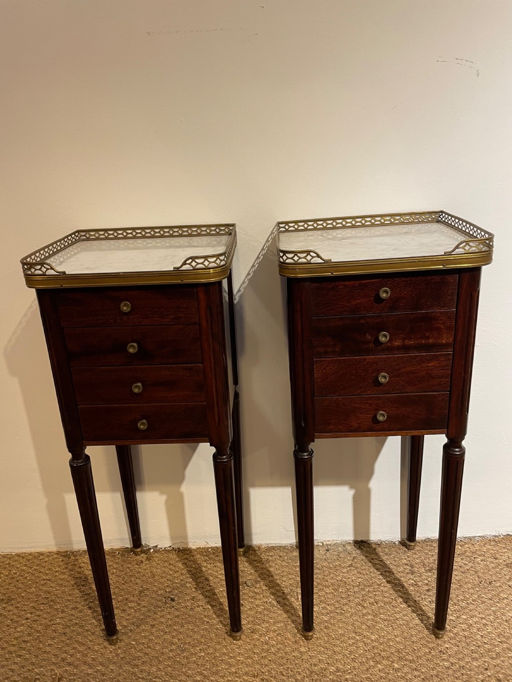 pair of louis xvi mahogany bedside cabinets